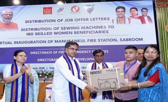 Tripura CM Dr. Manik Saha distributes Sewing Machines to women beneficiaries.